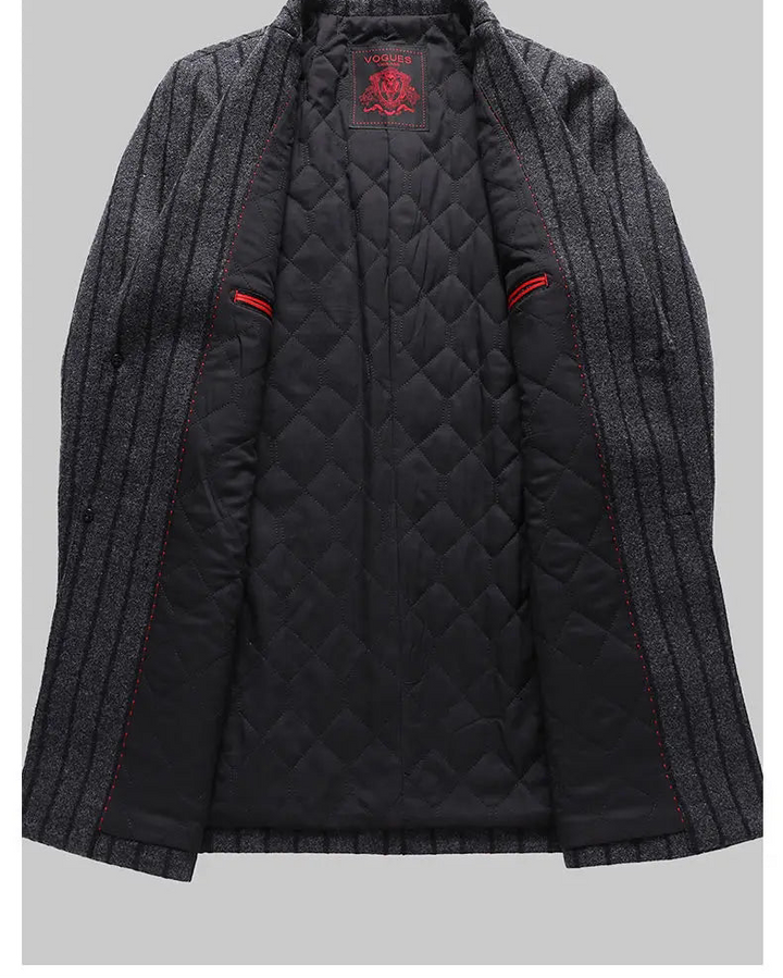 Quilted jacket with ribbed sleeves on a gray background