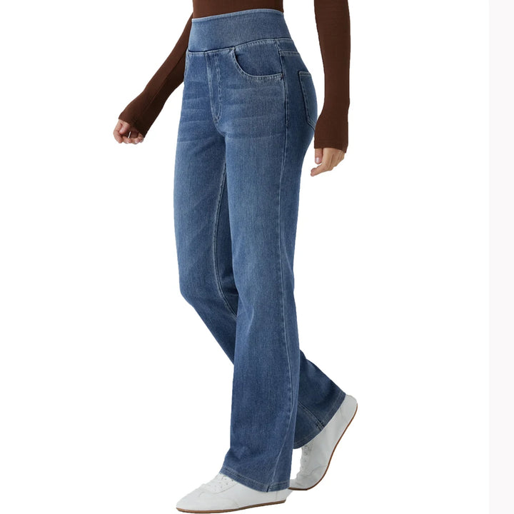 Light blue bootcut pull-on denim jeans shown in side profile, with front pocket.