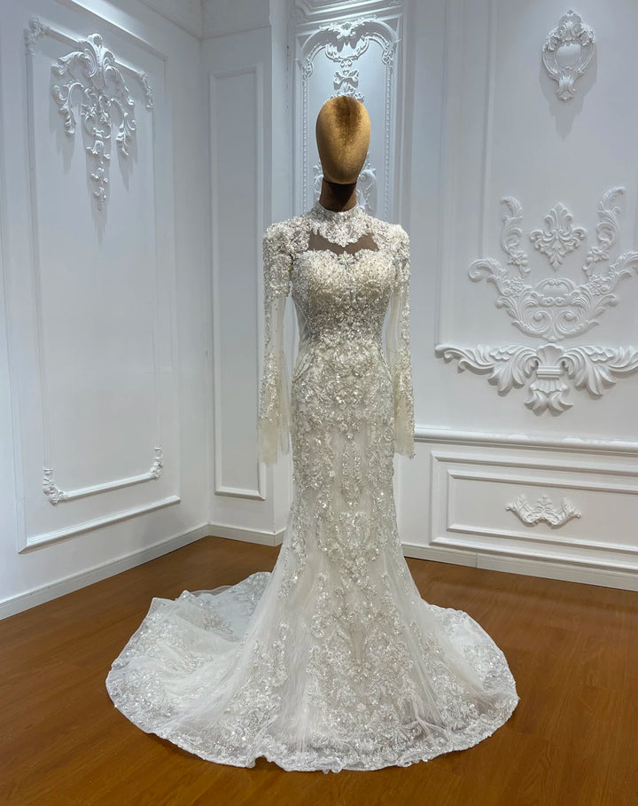 Ivory beaded lace skirt with long sleeves and scalloped lace overlay