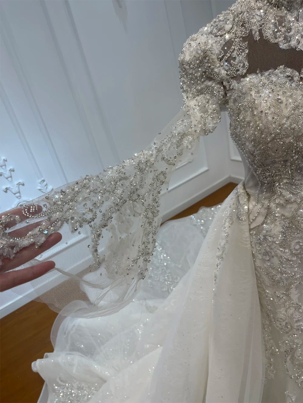 Beaded lace detail on sheer bodice and tulle skirt overlay