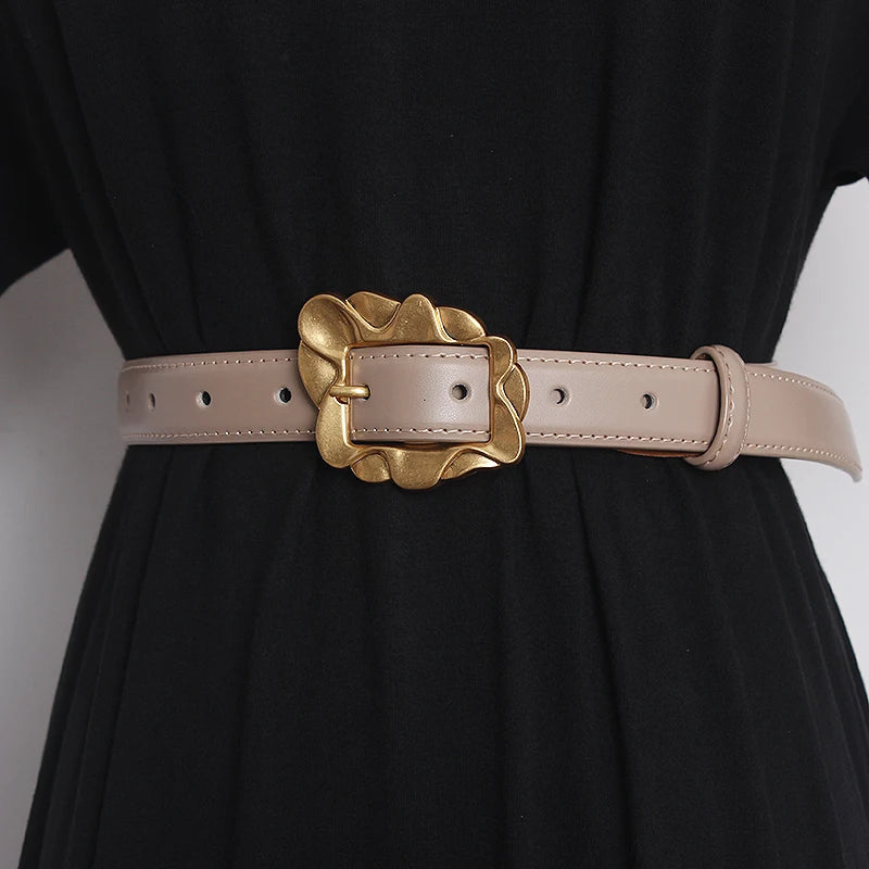 Light beige leather narrow waist belt with gold-tone floral square buckle and pin closure