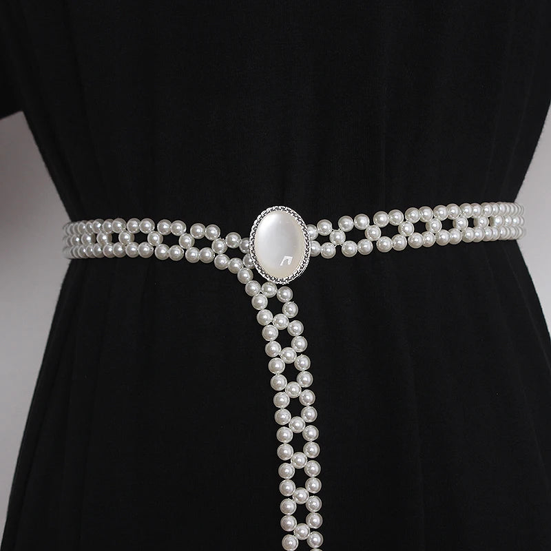 Pearl knitted waist belt with silver-tone round buckle and hanging pearl fringe
