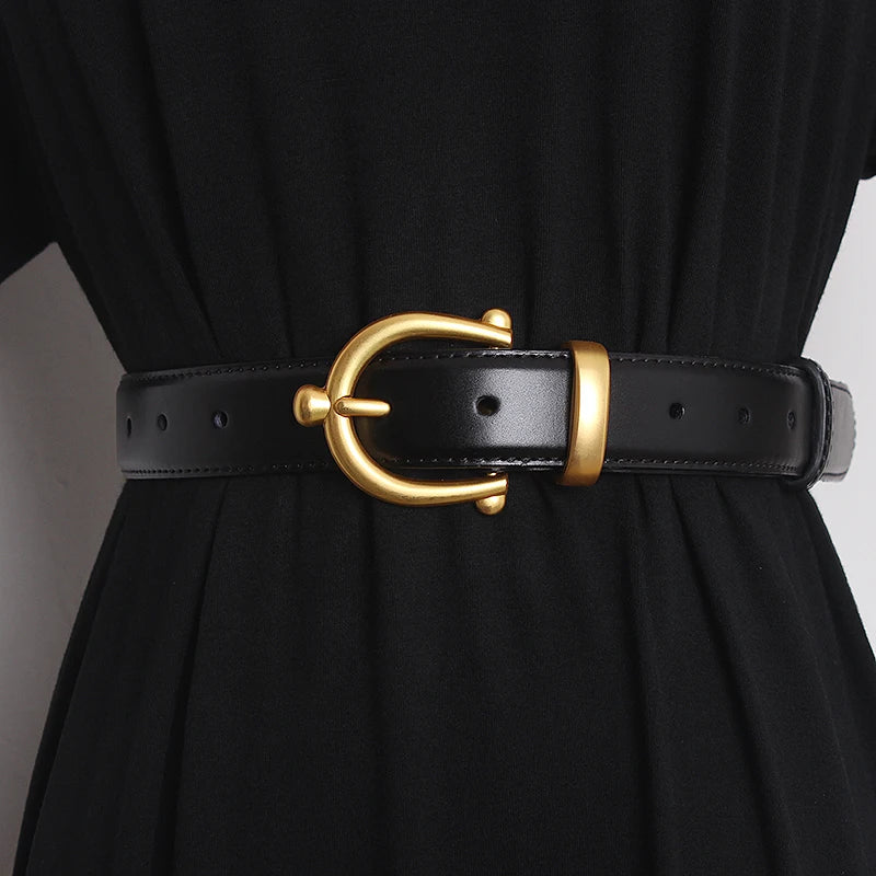 Black leather waist belt with gold-tone buckle ring and punched adjustment holes