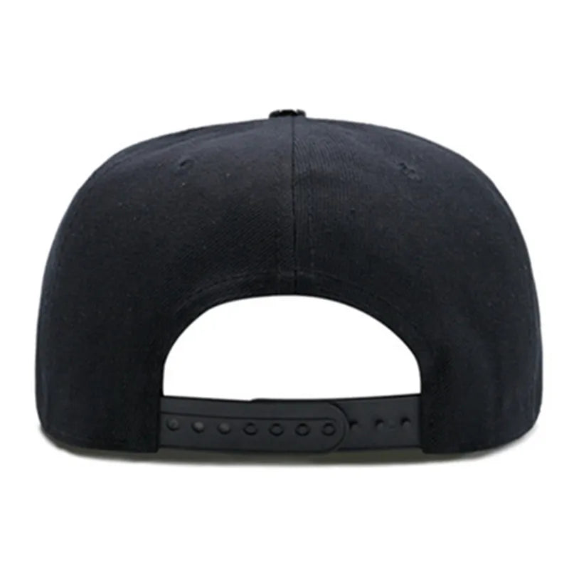 Black flat brim cap with simple crown panel and studded strap band on brim
