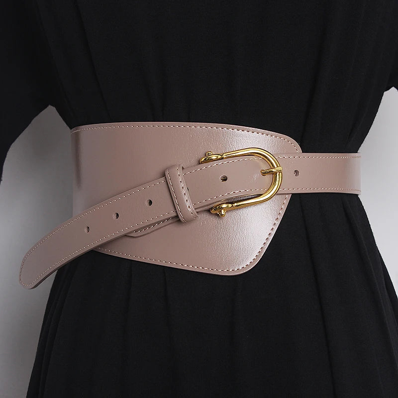 Light khaki leather wide waist belt with gold oval buckle and eyelet holes