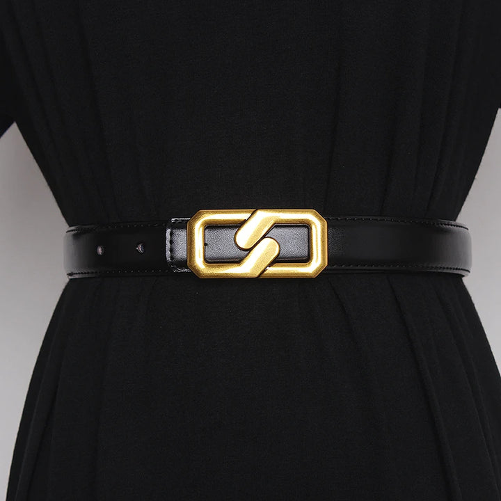 Black genuine leather women’s belt with gold-tone buckle and punched holes