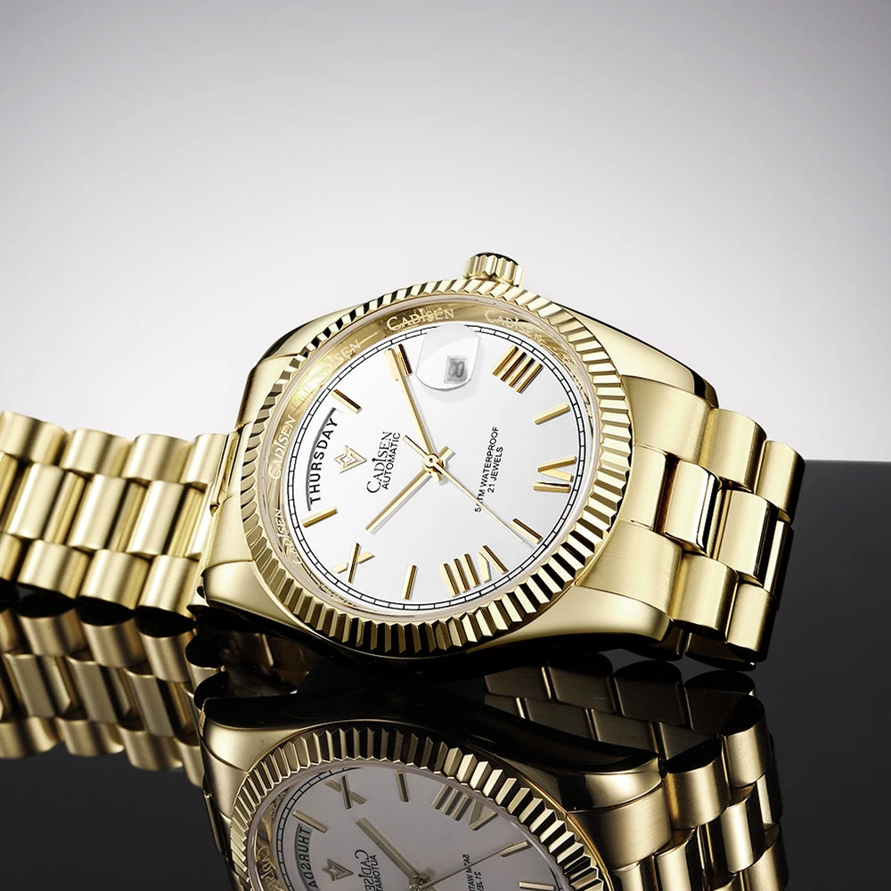 Gold-tone men’s automatic wrist watch with white dial, day window, and metal bracelet