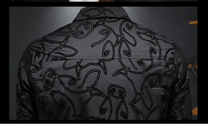 Black bomber jacket sleeve and back detail with flocked abstract pattern