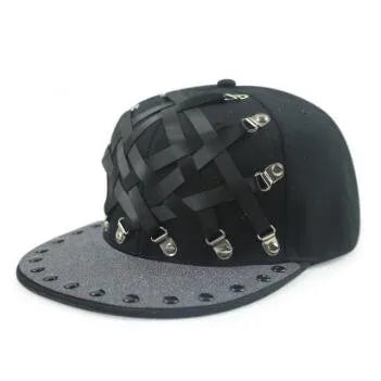 Dark flat brim hat with black lattice straps and silver studded brim panel