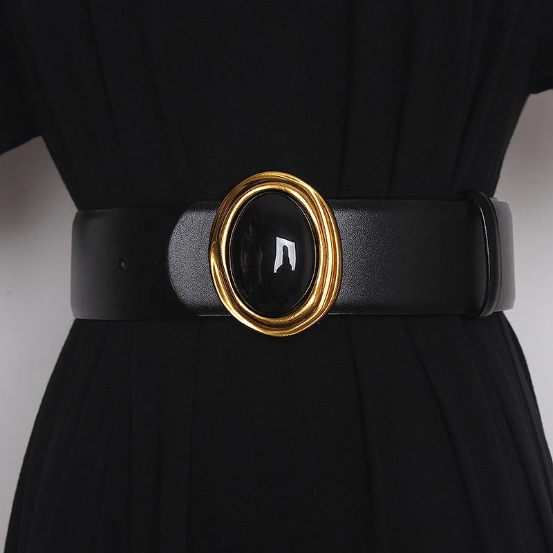Black wide leather belt with oval gold buckle