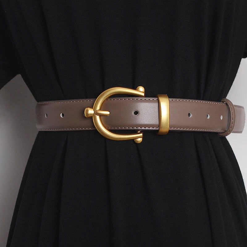 Brown leather waist belt with gold-tone buckle ring and punched adjustment holes
