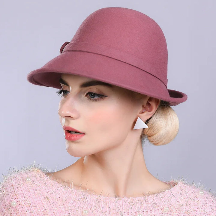 Dusty rose wool pillbox hat with side flower embellishment