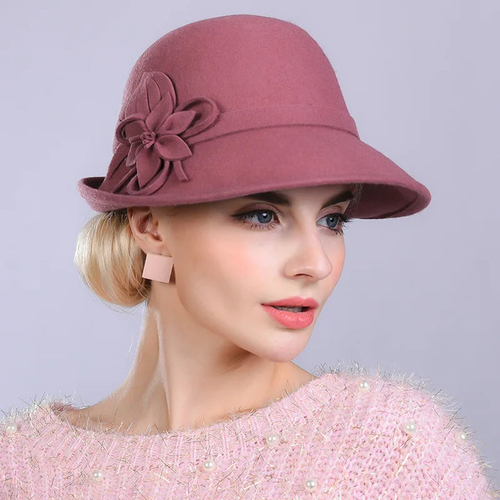 Mauve pink wool pillbox hat with large fabric flower and side bow