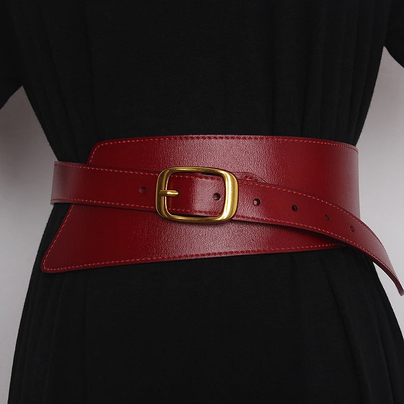 Red leather corset belt with gold buckle, double-row stitching, adjustable strap holes
