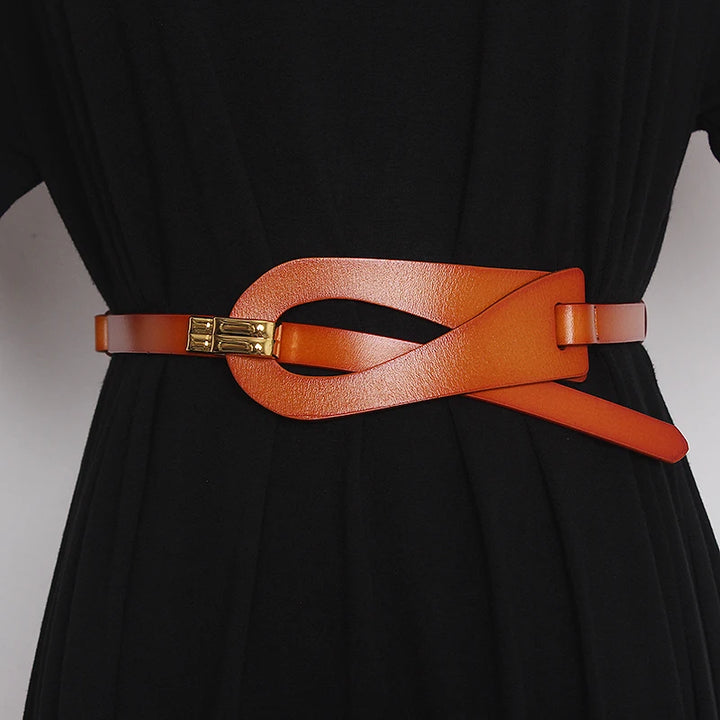 Women’s corset belt in orange-brown genuine leather with gold-tone buckle and ring hardware