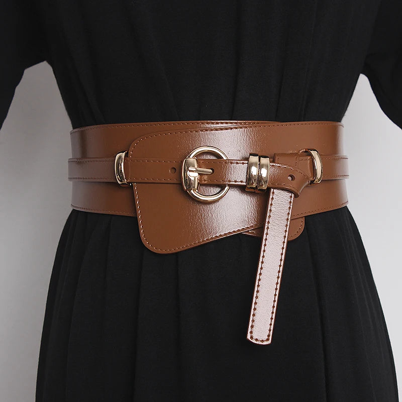 Brown genuine leather corset belt with silver-toned buckle, front pocket panel, and T-tab