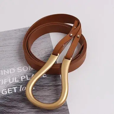 Wide belt with gold-tone heart buckle and brown leather strap, metal eyelets