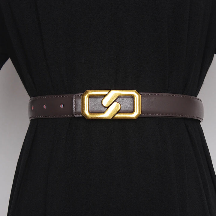 Brown genuine leather women’s belt with gold-tone buckle and punched holes