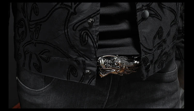 Black bomber jacket waist close-up with patterned placket and silver-tone buckle accent