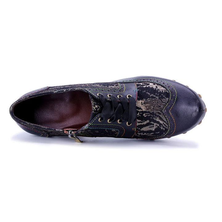 Women’s leather heel pumps, dark blue lace-up with snake-print vamp and open collar