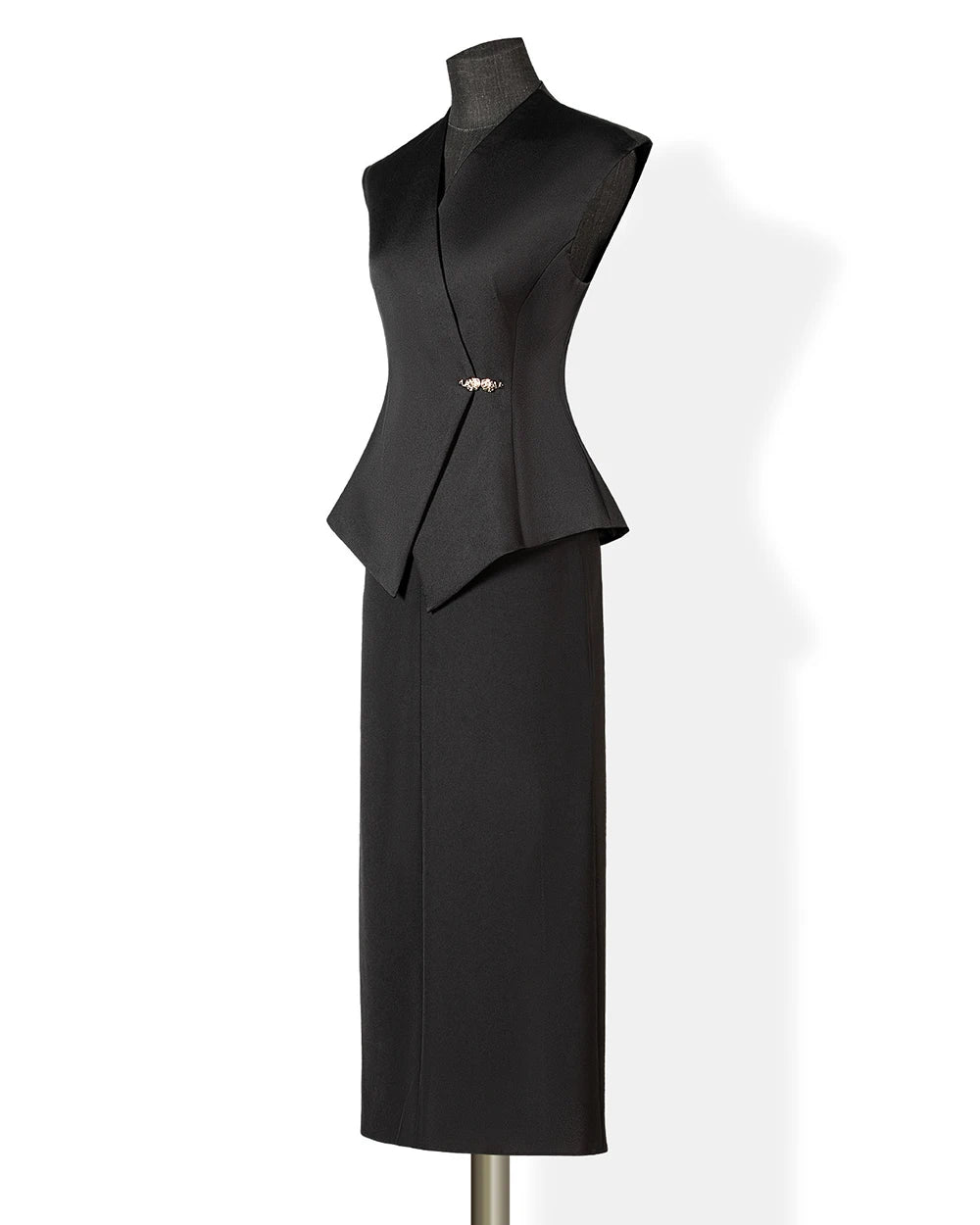 Black womens side view peplum vest and mid-calf skirt set with asymmetrical overlay