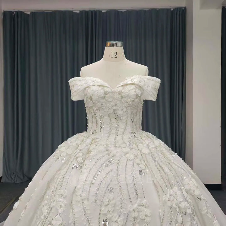 White lace bride dress front view with off-shoulder sleeves and sparkly beading