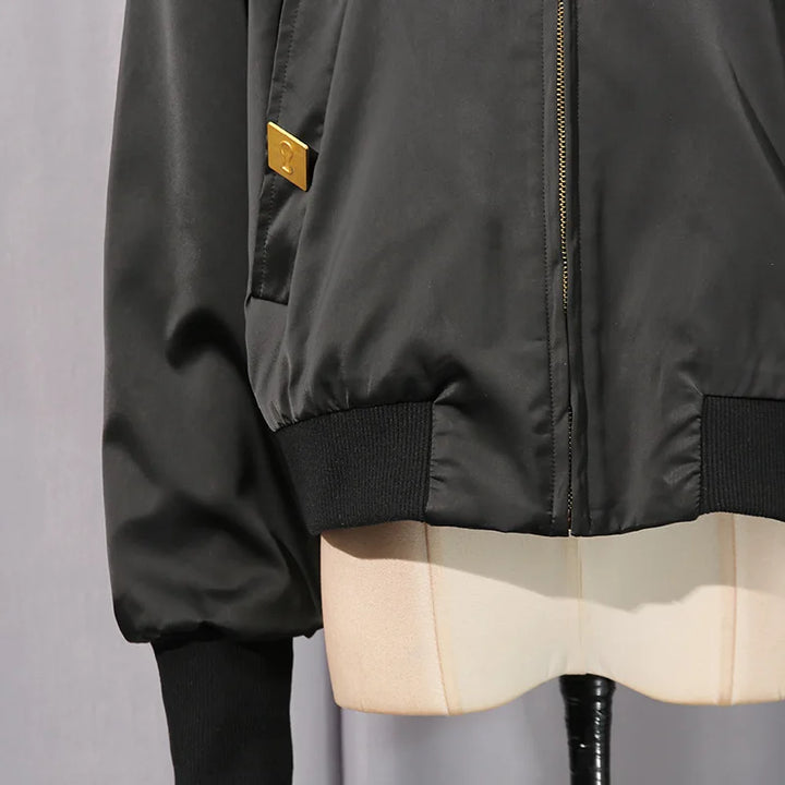 Women’s spliced fashion coat sleeve and zipper, black with ribbed cuff and gold zipper