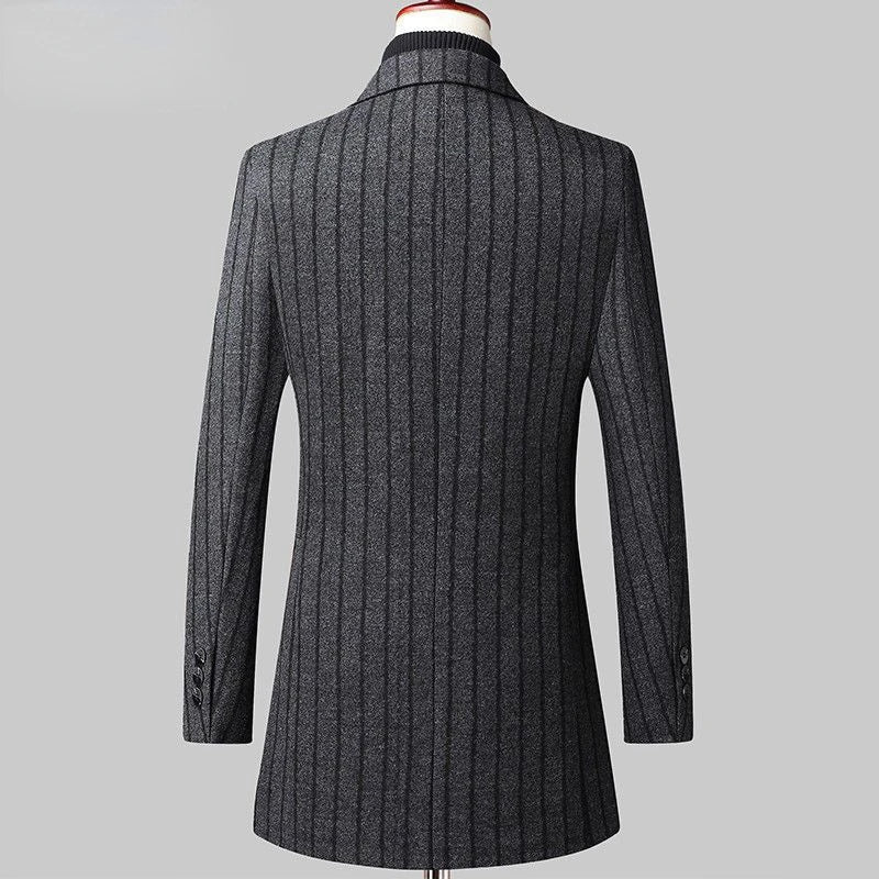 Gray textured coat on a mannequin against a gray background