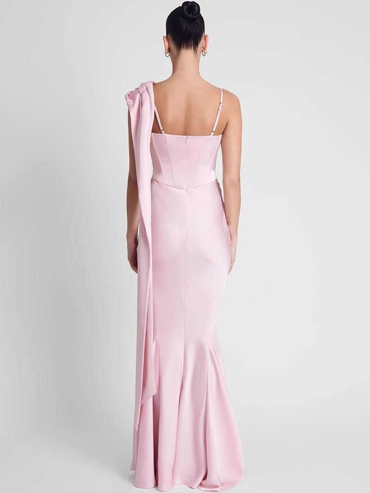 Women’s satin party maxi dress in blush pink, open-back design with thin spaghetti straps