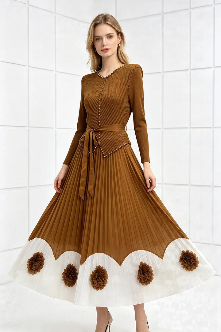 Golden-brown pleated midi party dress with long sleeves, tie waist, scalloped pom hem with appliques.