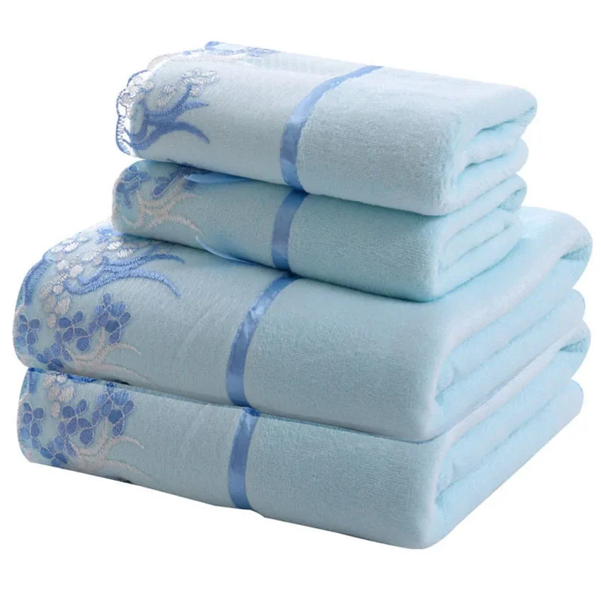 Light blue lace-pattern microfiber towels, folded in a three-stack set