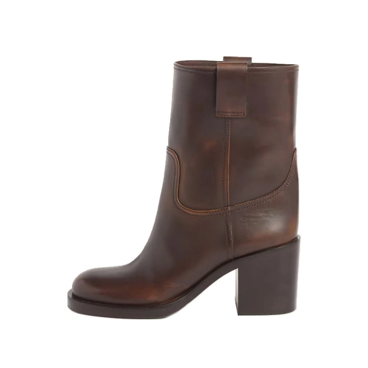 Brown ankle boots with round toe, pull-on design, and chunky block heel