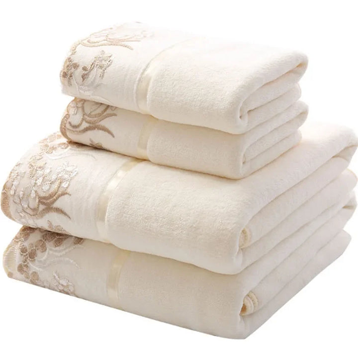 White lace-pattern microfiber towels, folded into a stacked set