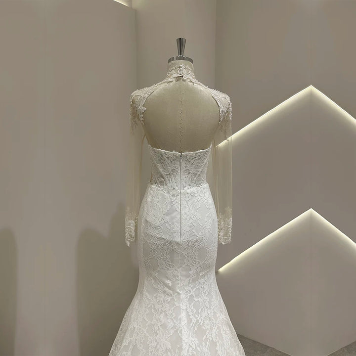 Ivory lace wedding gown with textured lace back bodice and mermaid skirt, long train