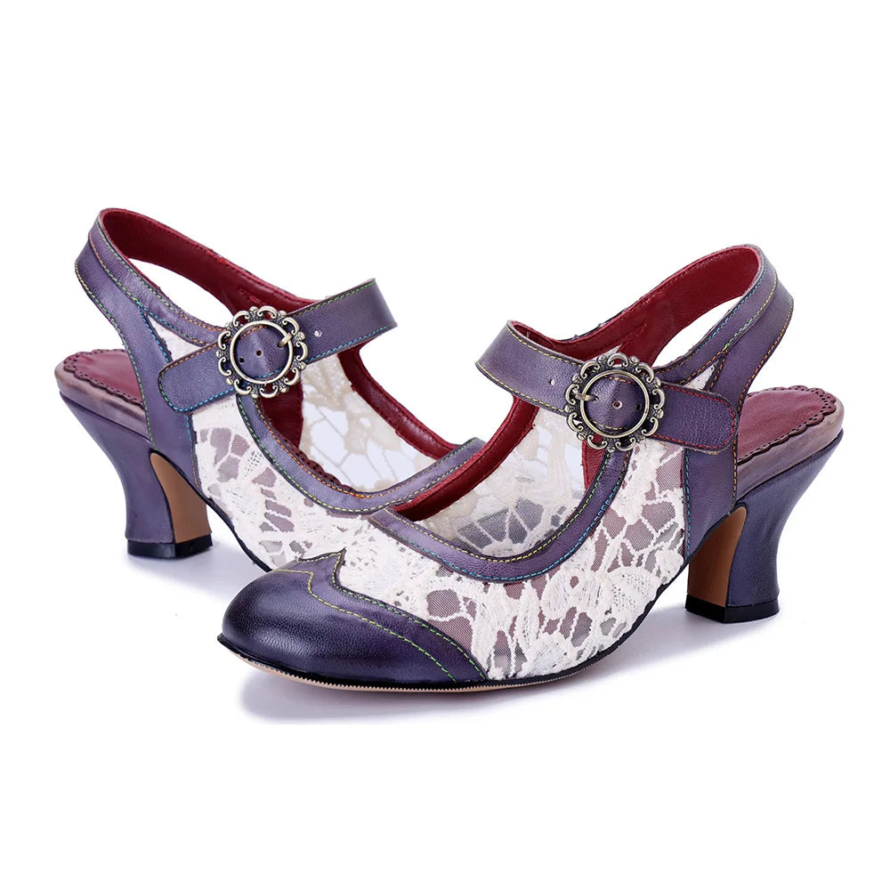 Women’s heeled T-strap sandals in navy/purple with white snake-print vamp and round ornament buckle
