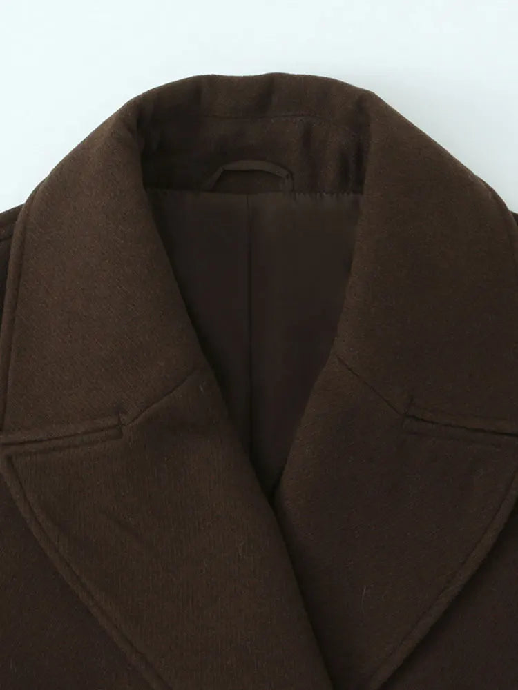 Dark brown overcoat with notched lapels and inner collar lining