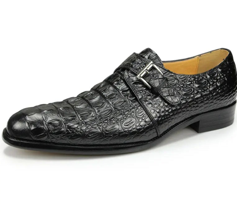 Two pairs of men's dress shoes, one red and one black, displayed side by side.