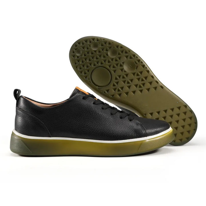 Black leather sneakers with textured rubber outsole and thick contrasting sole