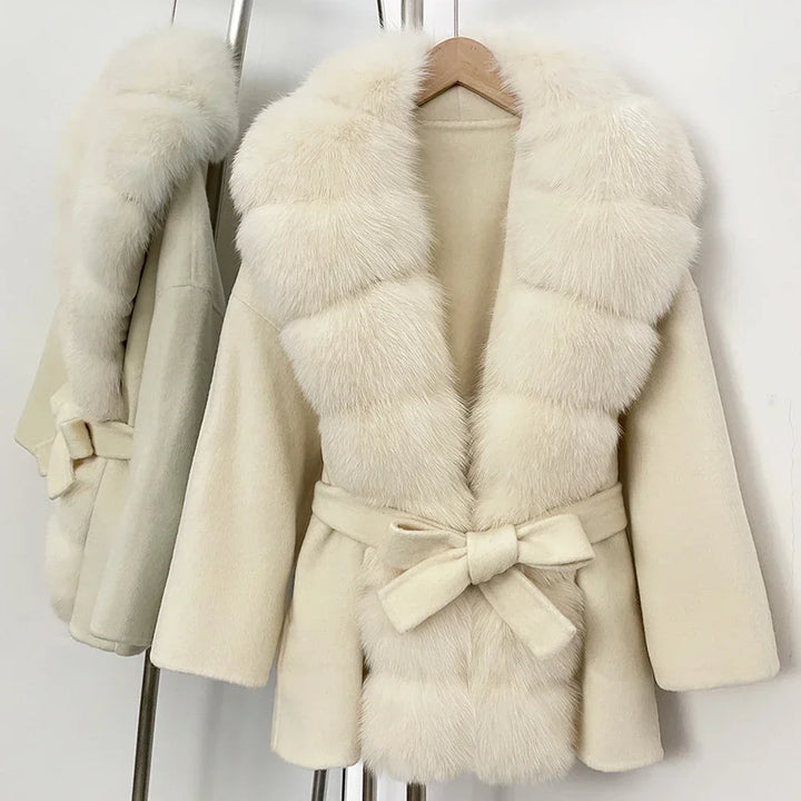 Cashmere-wool coat in off-white with faux fur collar and trim, tied waist belt