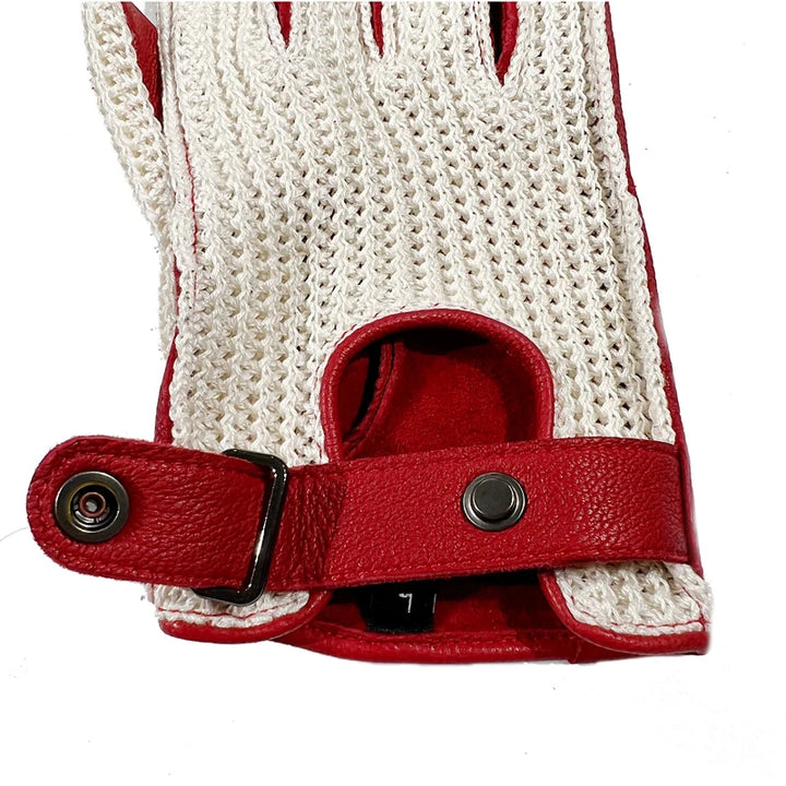 Red leather men’s gloves with snap button strap and cream knitted cuff panels.