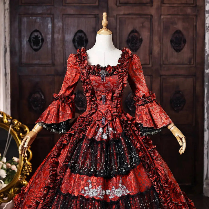 Wine-red ball gown with corset bodice, ruched pattern, off-shoulder ruffle trim