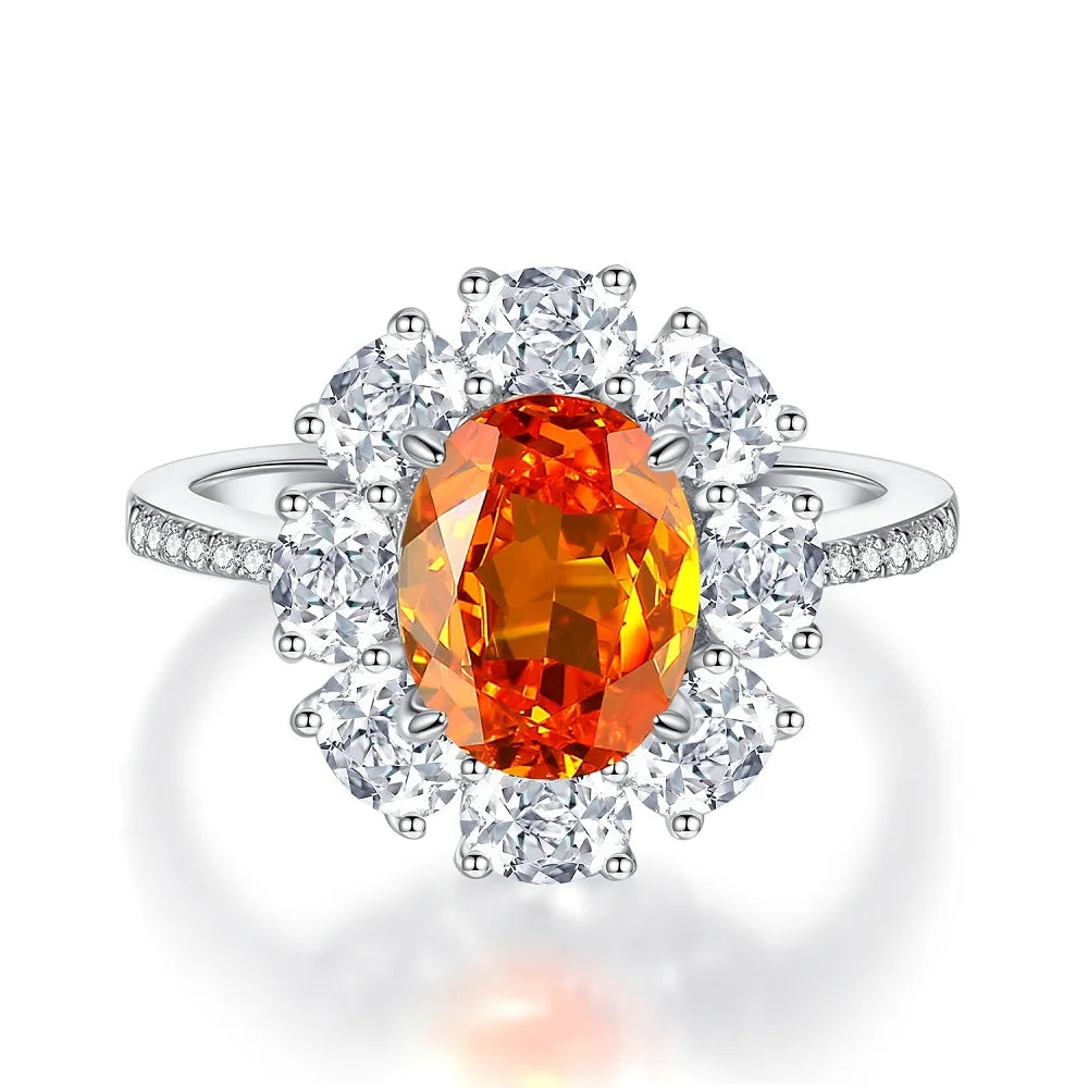 Diamond halo ring with oval orange center stone and round diamond accents