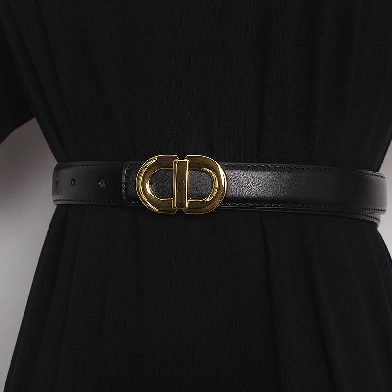 Black narrow leather waist belt with gold-tone double D buckle and punched holes