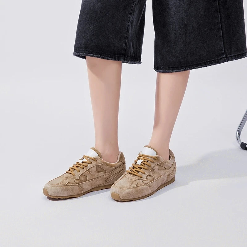 Women’s khaki beige leather flat sneakers, lace-up side view with tan sole