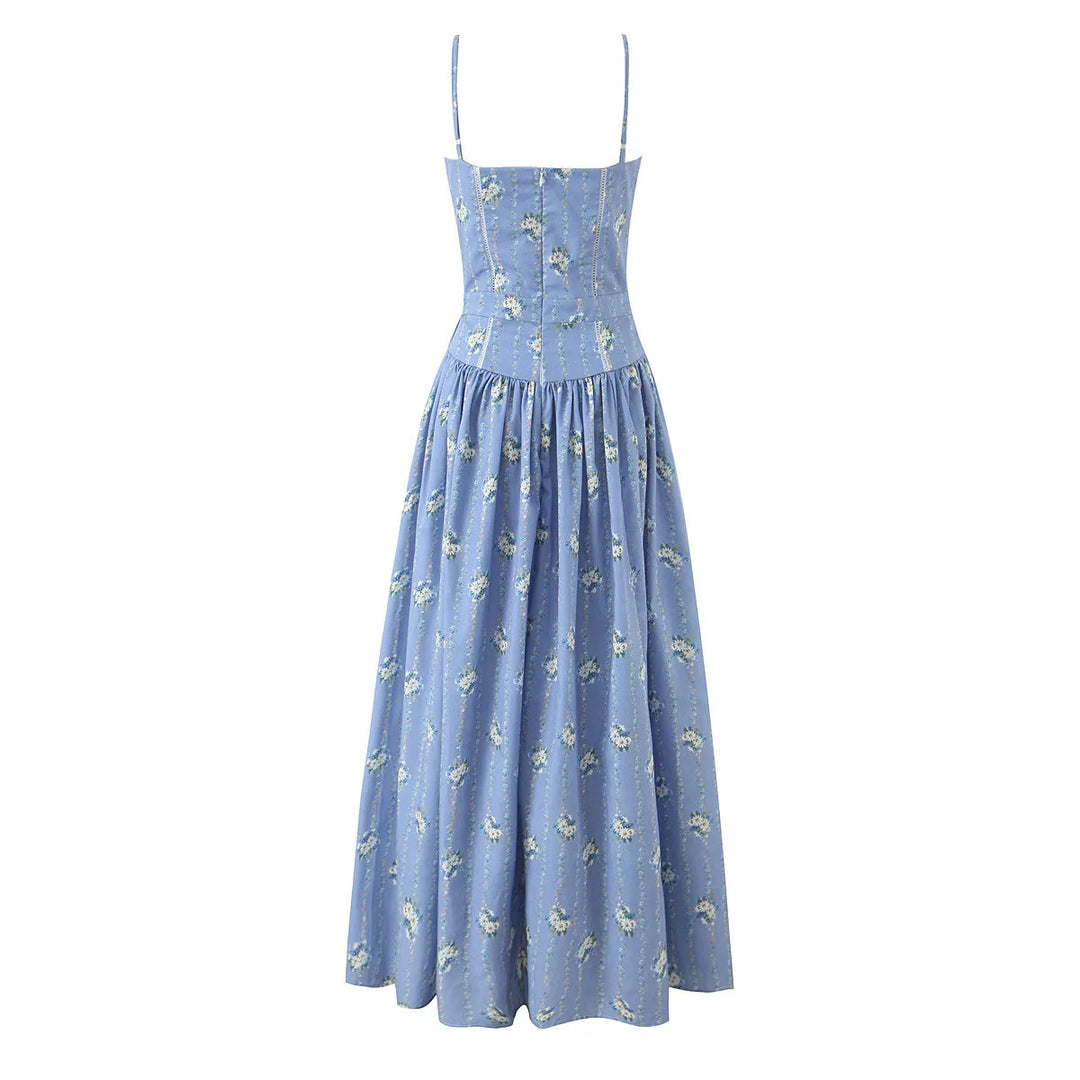 Blue daisy-print midi sundress with gathered tiered skirt and thin straps