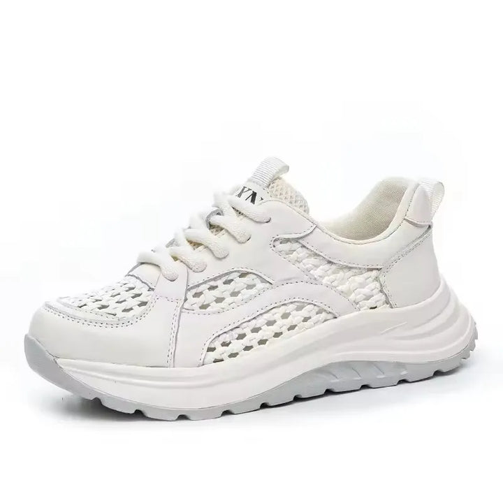 White woven mesh lace-up sneakers with padded collar and chunky platform sole.