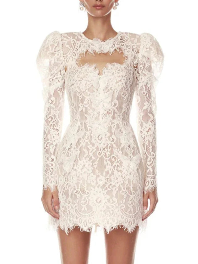 White lace dress with long sleeves on a white background