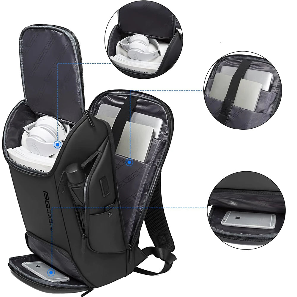 Black waterproof backpack opened to show laptop and accessory compartments, zip closures