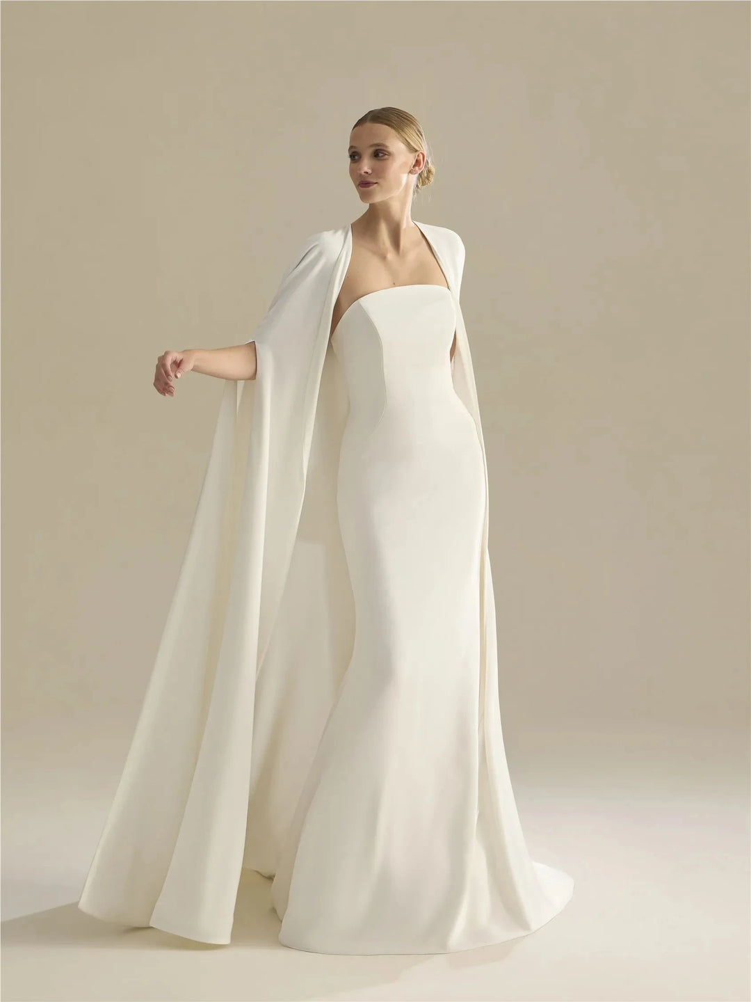 Off-white long bridal cape with open front drape and flowing train