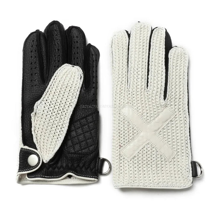 Black and white knitted motorcycle gloves, leather palm, metal ring and snap cuff strap